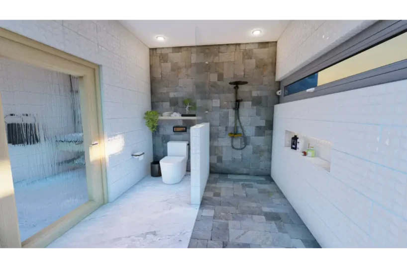 Baño exterior moderno en Las Terrenas, Samaná, con ducha y vista al exterior.