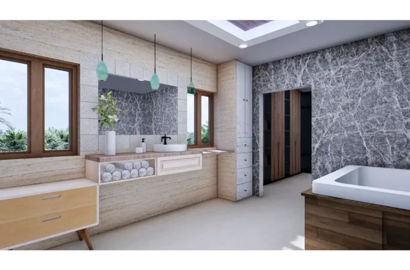 Amplio baño con bañera y vista al exterior.