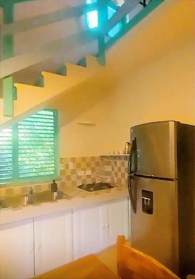 cheap condos for sale in dominican republic cocina y vista a la escalera