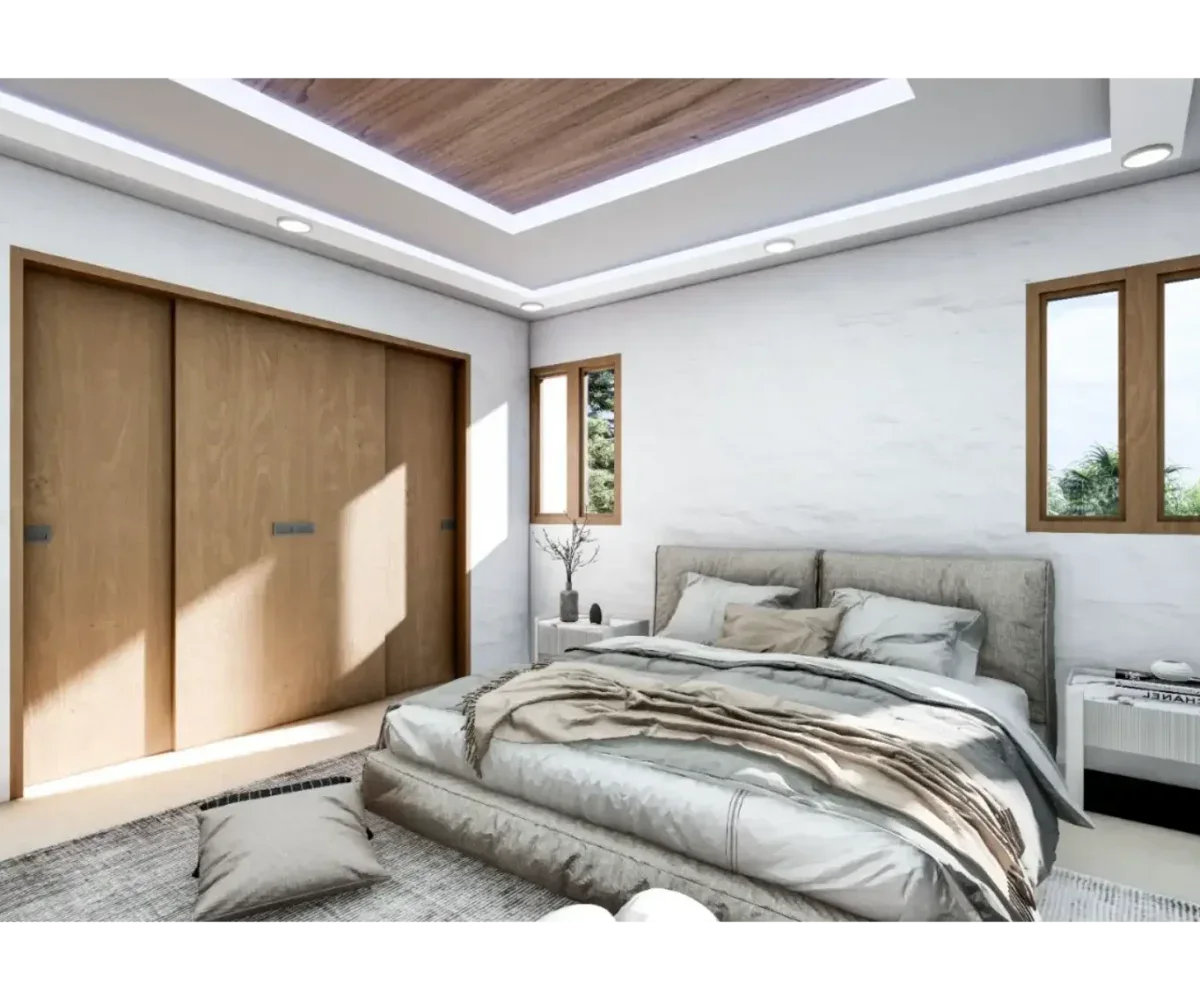 Dormitorio luminoso y espacioso en Las Terrenas, con ventanas grandes y diseño minimalista.