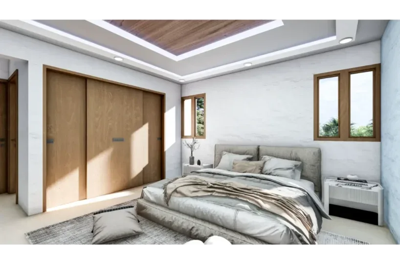 Dormitorio luminoso y espacioso en Las Terrenas, con ventanas grandes y diseño minimalista.