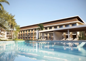 Hotel en Las Terrenas con piscina y jardines, ideal para vacaciones y descanso.
