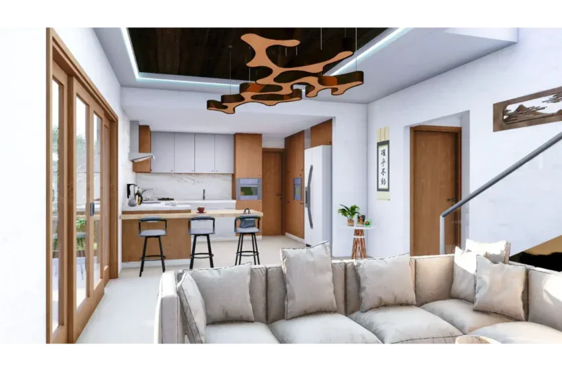Amplio salón moderno en Las Terrenas con cocina abierta y área de descanso elegante.